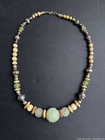 Full view of beaded necklace showing layout and clasp