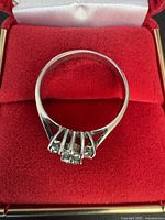 Side view of sterling silver ring showing hallmark and setting