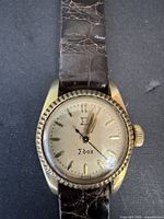 Front view showing dial, bezel and strap