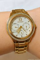 Watch on wrist showing full front view