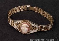 Bracelet angled to show cameo and filigree links