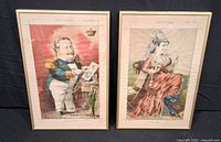 Both framed caricature prints side by side