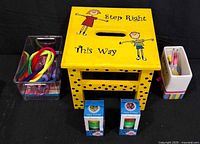 Group shot with step stool centered, party items surrounding