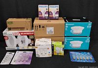 Entire lot showing multiple boxed and blister-packed bulbs