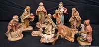 Full group view of all nine Nativity pieces