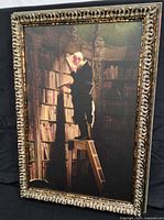 Front view of framed painting showing scholar on ladder in library