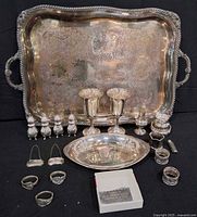 Entire lot overview with platter, goblets, shakers, dish, rings, cufflinks, polishing cloth