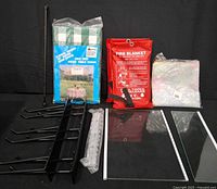 All items overview: fire blankets, tablecovers, hooks, glass shelves, rod