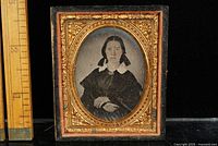 Front view of daguerreotype showing subject, mat, and partial case