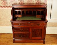 Full view of Eastlake roll-top desk closed showing overall design and proportions