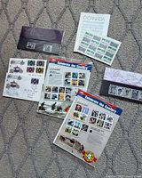 Group shot of all stamp items spread on carpet