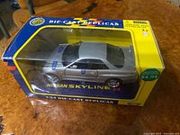 Boxed 1:24 scale Nissan Skyline R die-cast model