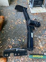 Full view of hitch showing mounting brackets, receiver tube, overall condition