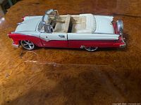 Top view of red/white Crown Victoria convertible model