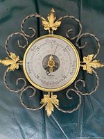 Front view showing entire barometer and frame