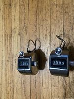 Front view of both mechanical tally counters showing displays 0101 and 1003