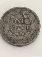 Reverse of 1857 Flying Eagle cent showing ONE CENT wreath