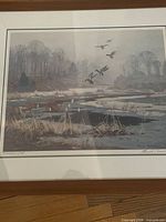 Full view of framed print showing winter landscape and geese