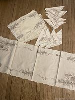 Full view of runner, placemats and napkins showing quantity and design