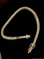 Full view of sterling tennis bracelet showing length and clasp