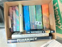 Box of Harry Potter hardcovers and three reference books