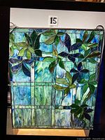 Full view of rectangular stained glass panel showing overall design and size