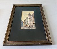 Full view of framed painting showing frame style and mat