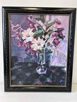 Front view of framed Leif Ostlund floral painting