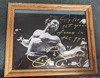 Front view showing signed photograph and full frame