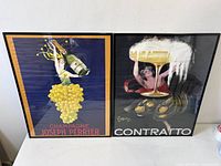 Front view of both framed posters showing graphics and frames