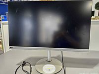 Front view of Acer CB272U monitor on stand with power cable