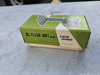 Green box top view showing BC Flash Unit branding