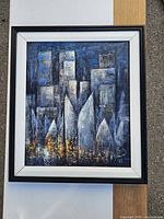 Full view of framed painting showing composition and frame style