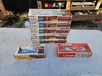 Stack of five Southern baggage cars with two additional caboose boxes