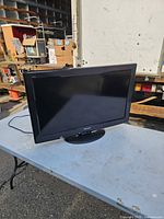 Front view of Panasonic 32-inch LCD TV on stand
