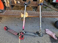 Both scooters standing folded out for full view