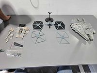 Overall lot view with Falcon, TIE Fighter parts, Snowspeeder parts
