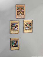 Fronts of four Exodia cards laid out: head, two arms, one leg