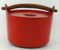 Front view of casserole with lid and teak handle attached