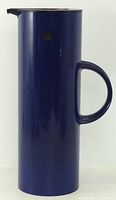 Full side view of blue Stelton vacuum jug showing handle and spout