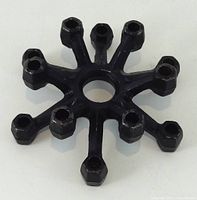 Top view showing eight-arm star shape and central ring