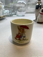Royal Doulton Bunnykins cup exterior illustration
