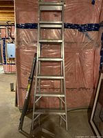 Front view of both ladders showing height and material