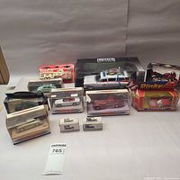 Group shot of all eleven boxed or partially boxed die-cast items