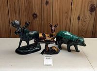 Group shot of four Blue Mountain Pottery animal figurines