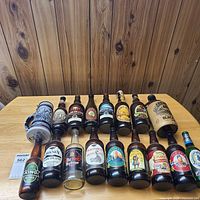 Group shot of Avon's stein and 14 bottles on table