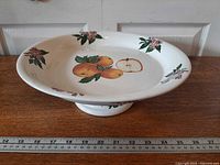 Top angled view showing full stand, pedestal, scale ruler