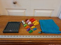 Entire set with board, vehicles, bag and ruler for scale