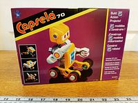 Front of Capsela 70 box showing branding and model features