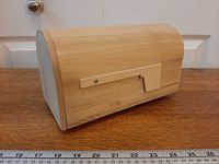 Mailbox right side view showing flag and curved top